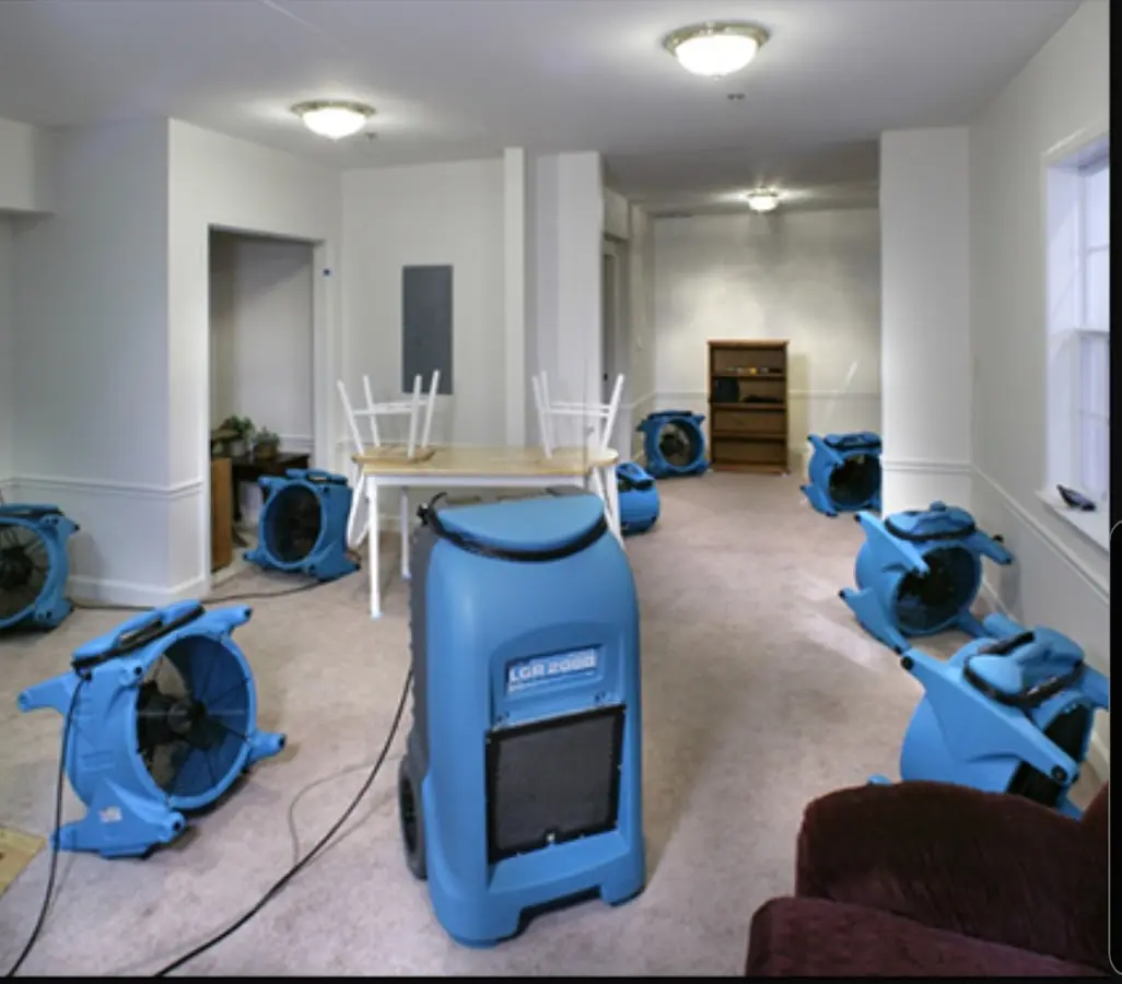 Air movers and dehumidifier setup for Water Damage Restoration in Dormont